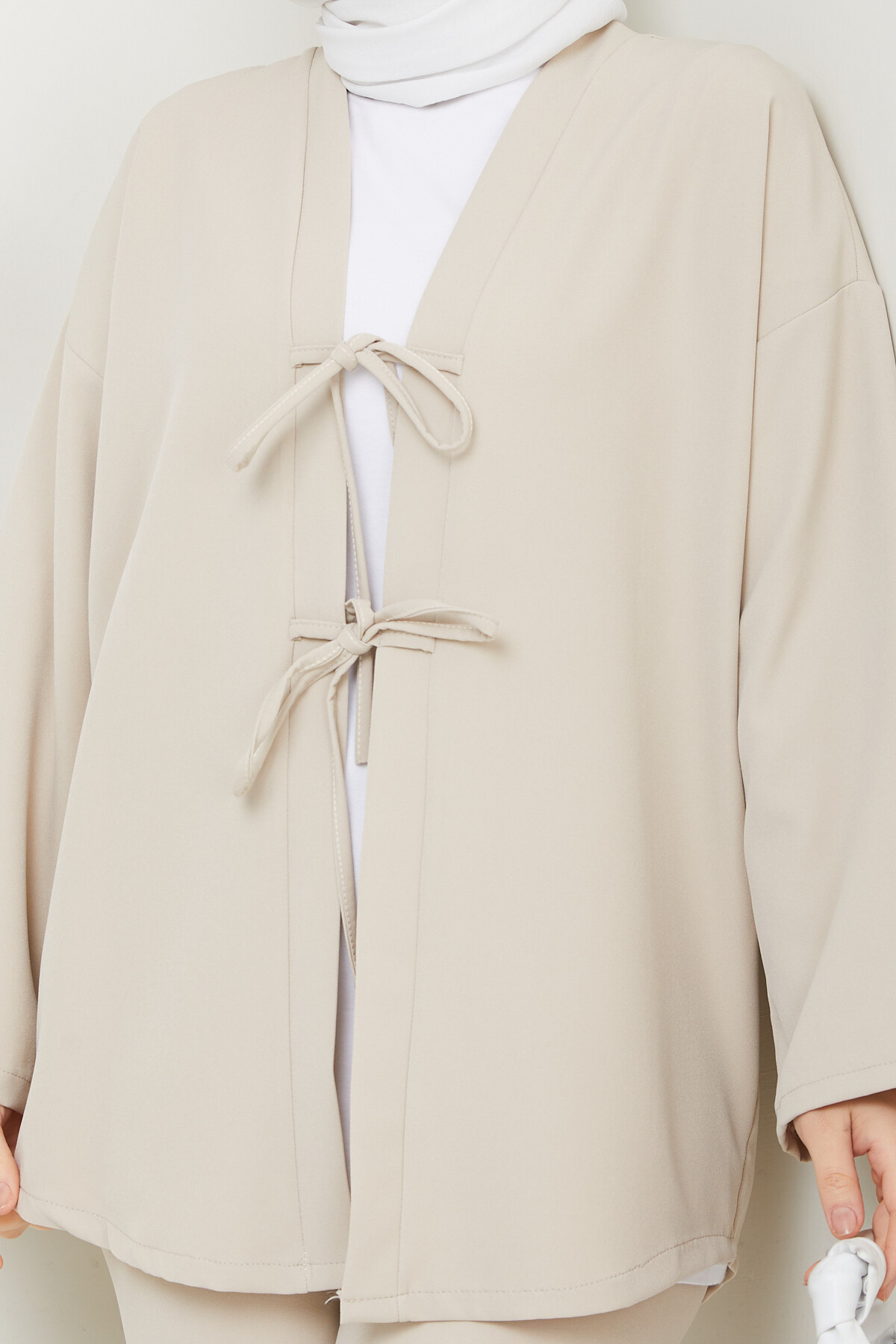 İKİ BAĞCIKLI PANTOLONLU TAKIM-KREM